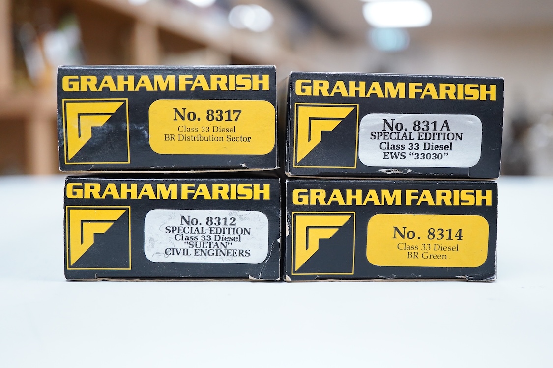 Four boxed Graham Farish N gauge railway Class 33 diesel locomotives; a BR, D6572 (8314), a BR Distribution Sector, 33 205 (8317), an EWS, 33030 (831A) and a BR, 33025 (8312).